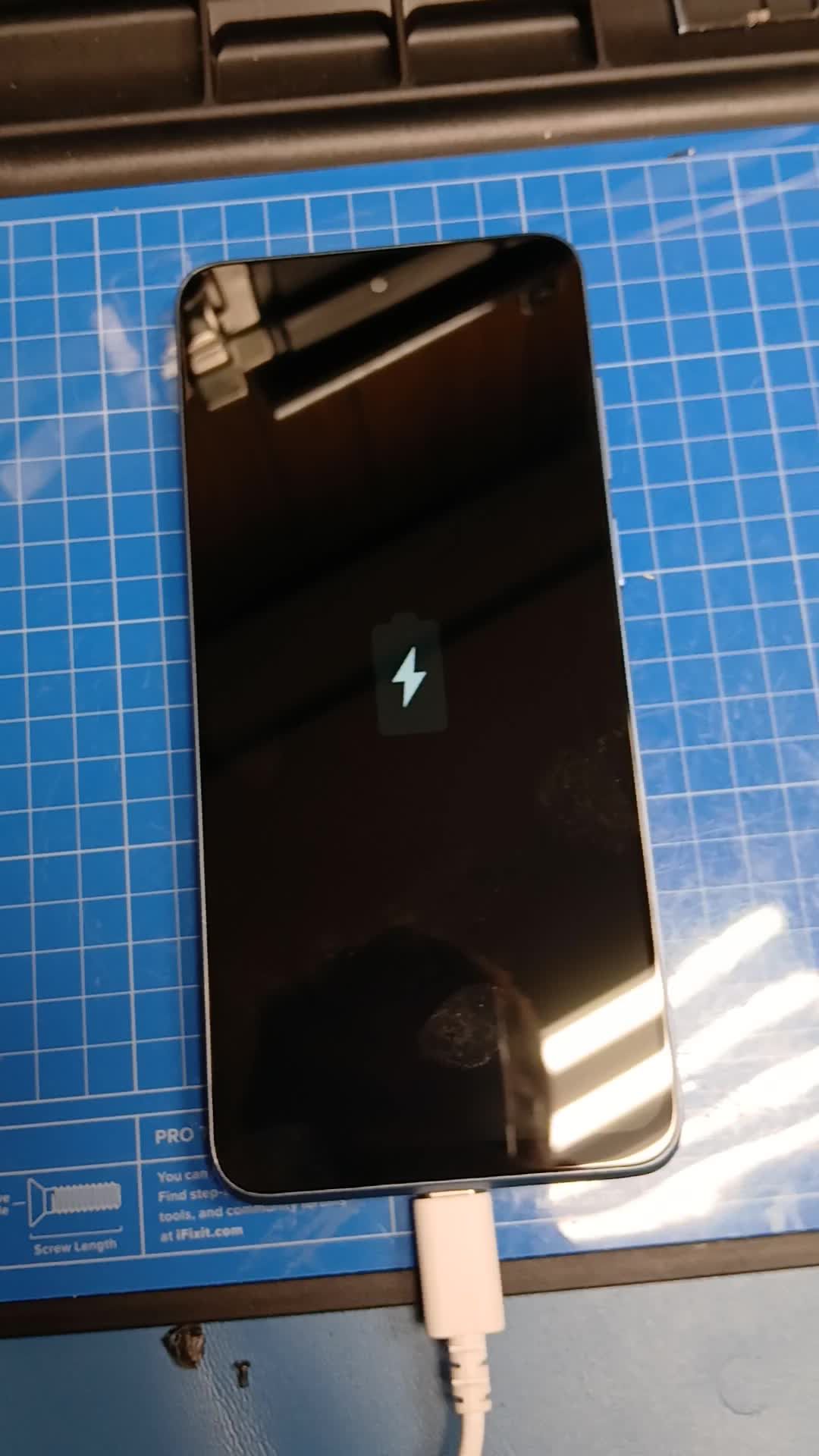 The same Moto G Stylus after repair: new display, glass clean